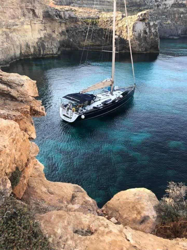 ACE anchored in a limestone cove in Malta