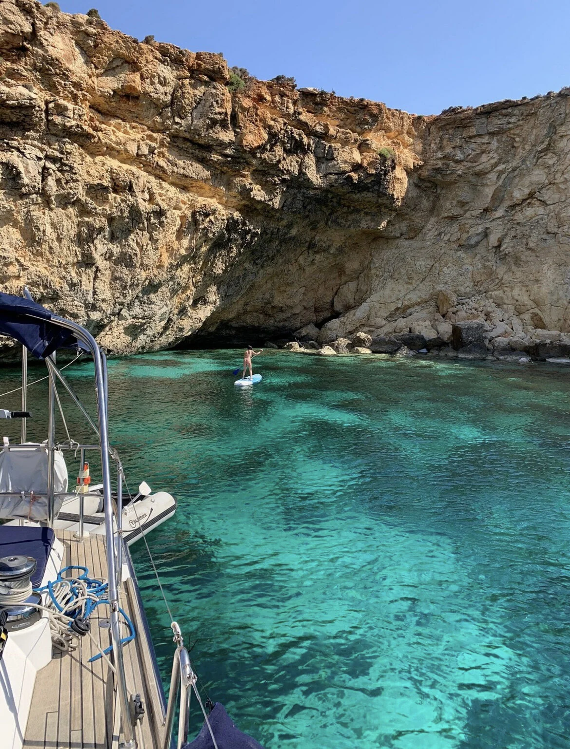 Guests relaxing on deck of the sailing yacht ACE in Malta